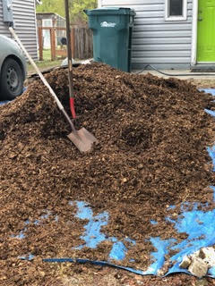 Shovels in Stockpile in a driveway at a home.