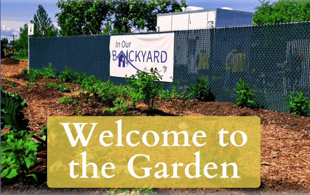 In Our Backyard Garden and Welcome sign